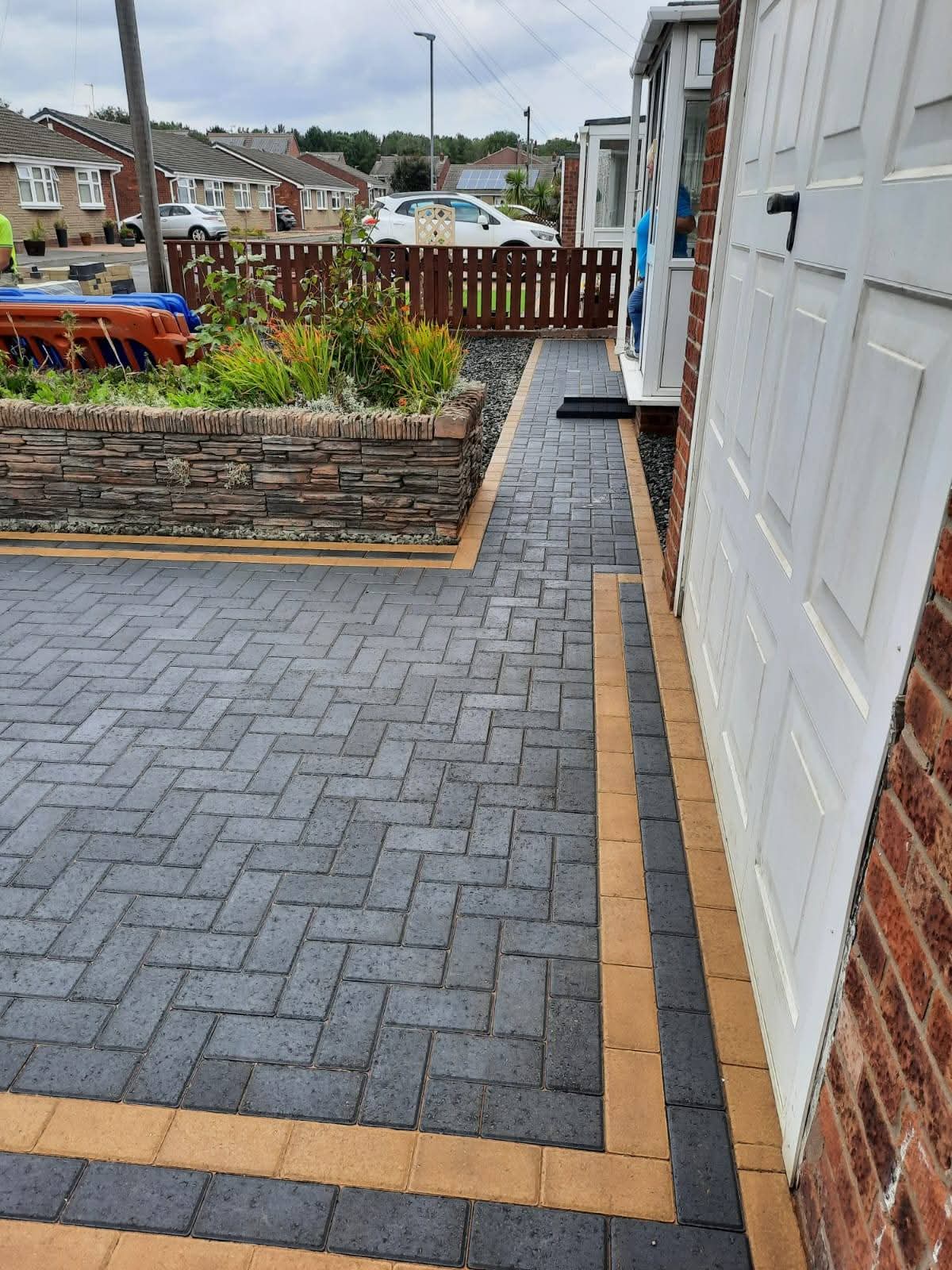Multi-colour block paving design with contrasting borders by E.R.D Paving