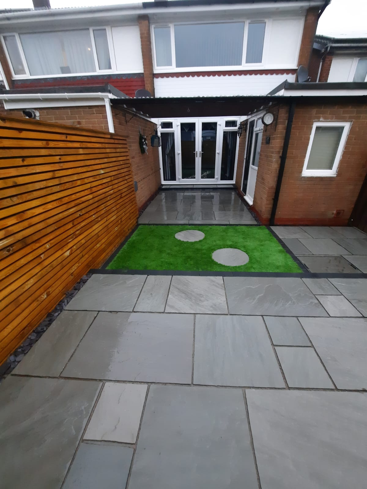 Pet-friendly artificial grass lawn installed by E.R.D Paving in Northumberland