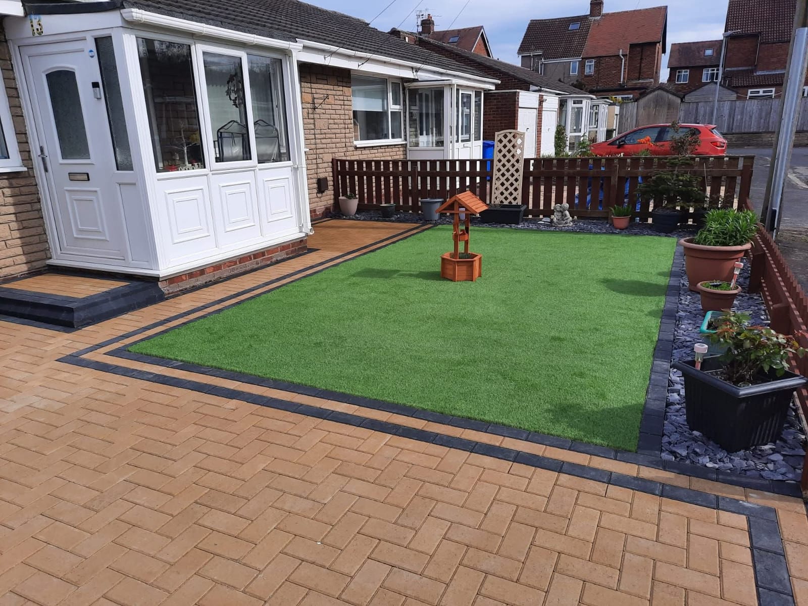 Complete garden transformation with retaining walls and patio by E.R.D Paving in the North East